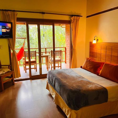 Mama Tungu Hostel บาญอส ภายนอก รูปภาพ