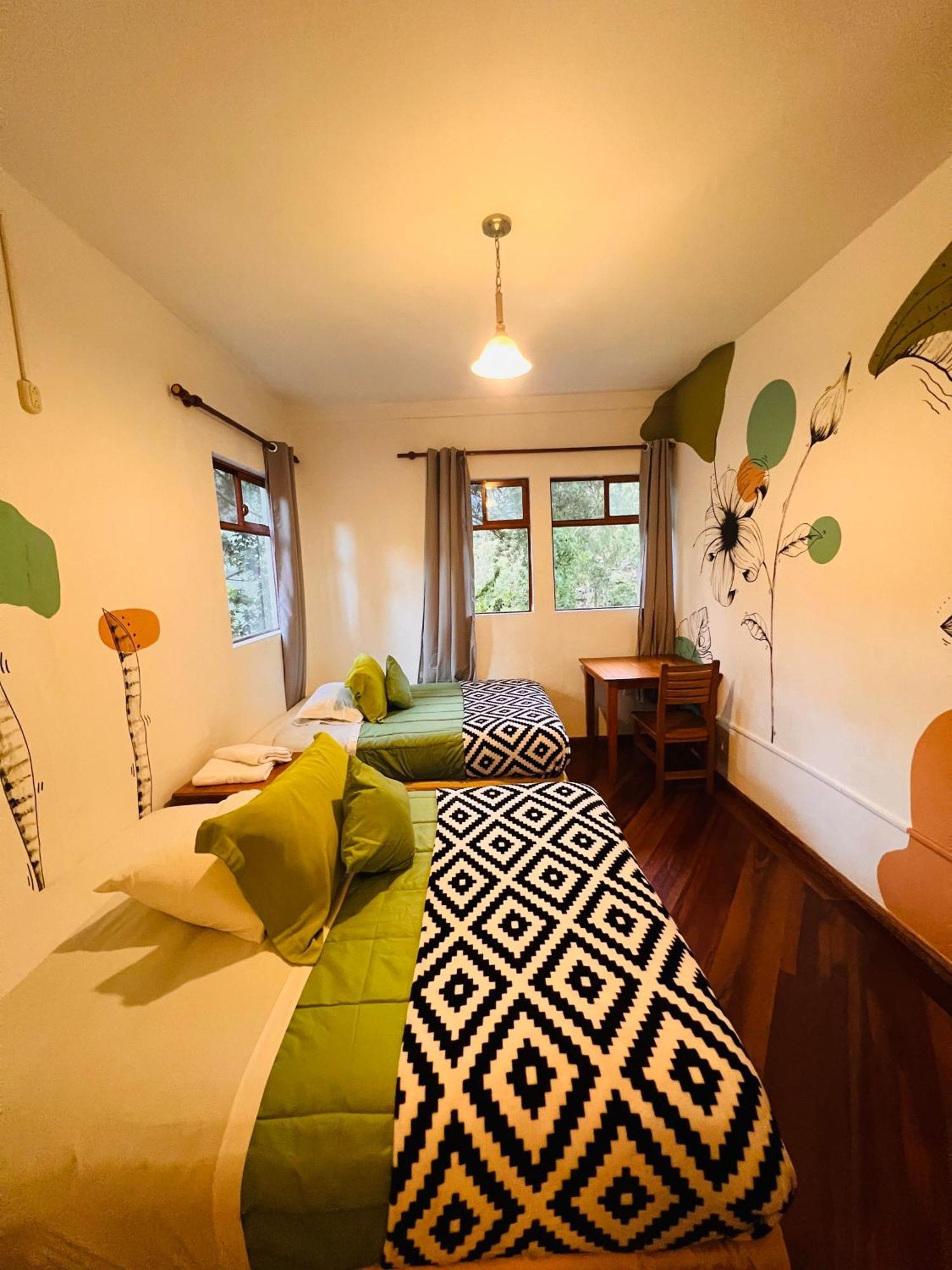 Mama Tungu Hostel บาญอส ห้อง รูปภาพ